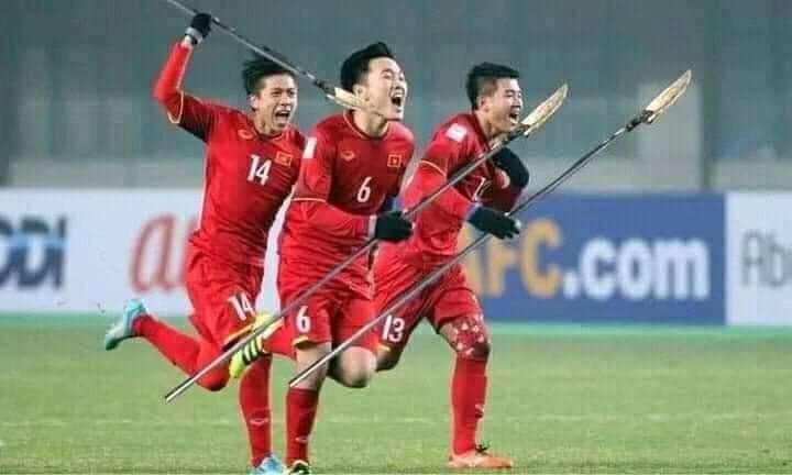 Các cầu thủ Việt Nam cầm phóng lợn ăn mừng sau khi ghi bàn
