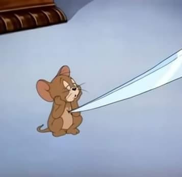 Chuột Jerry bị dí dao vào tim nhưng không quan tâm